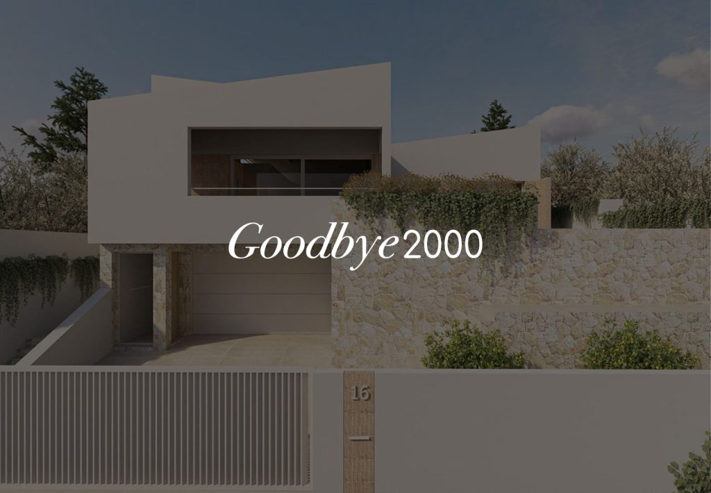 Fachada moderna de villa residencial con muros de piedra, vegetación y garaje - Proyecto Goodbye 2000